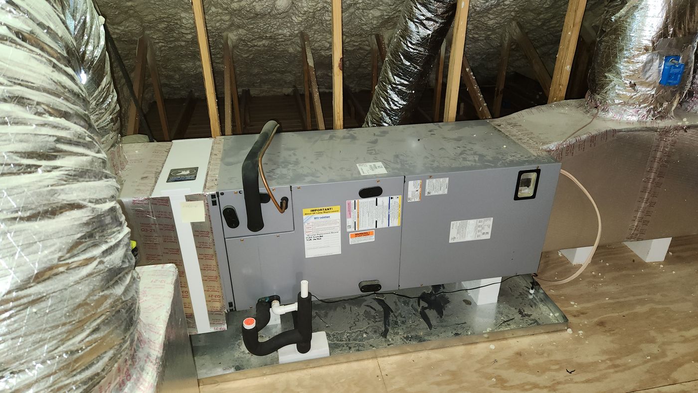 Air handler set on its attic platform, flex both sides